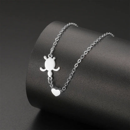 EtherealBe sea turtle pendant necklace for women featuring a delicate design on a silver chain