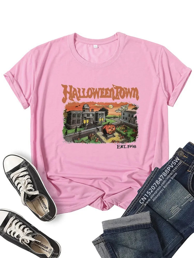 EtherealBe Halloween graphic t-shirt for women in pink featuring a spooky Halloween Town design