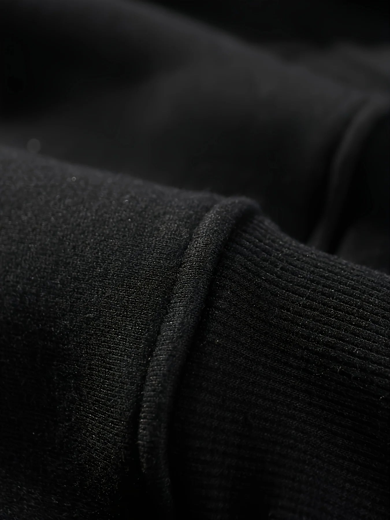 Close-up of soft fabric showing detail of a Halloween spooky hoodie for women