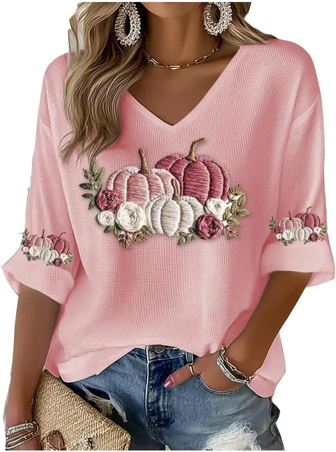 Women's Halloween graphic t-shirt in pink with embroidered pumpkins and floral details