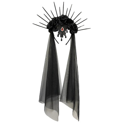 Gothic black rose veil headband with spikes and flowing black tulle ribbons for a dramatic look