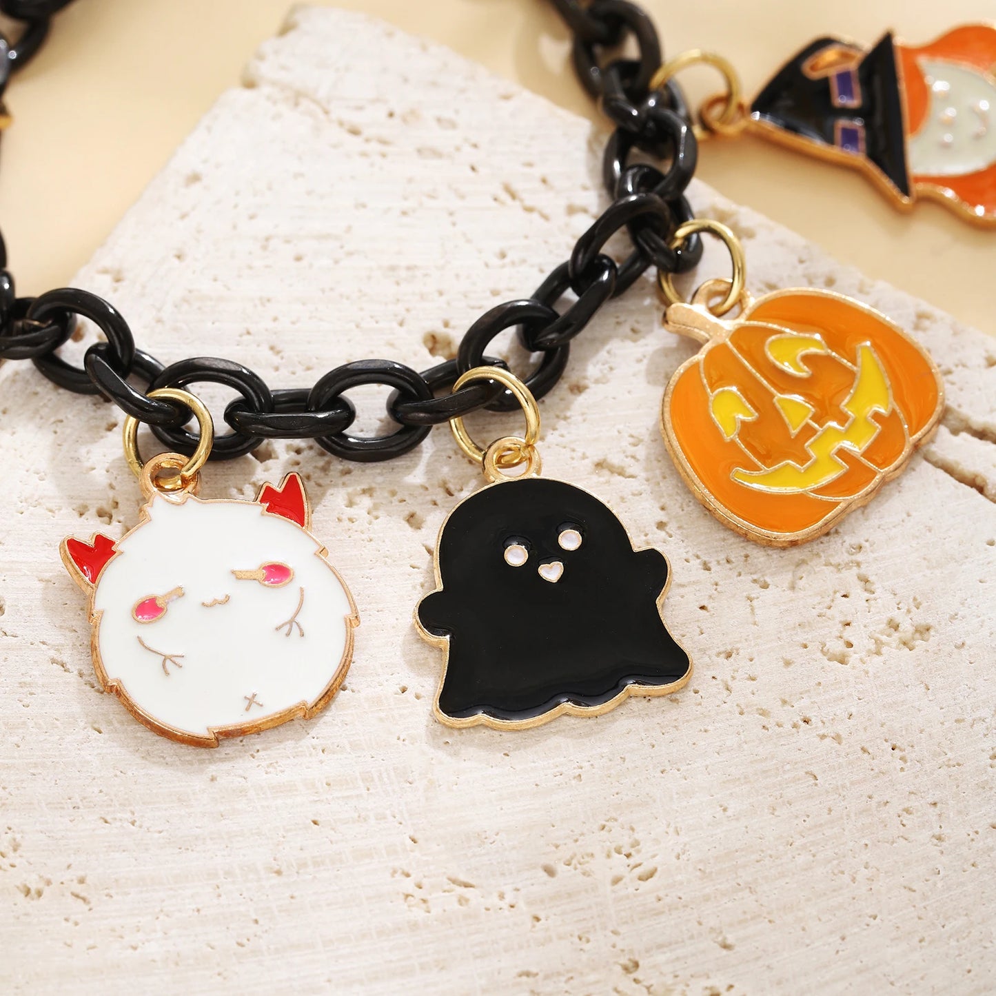 EtherealBe Halloween charm bracelet for women featuring spooky ghost, pumpkin, and spooky character charms