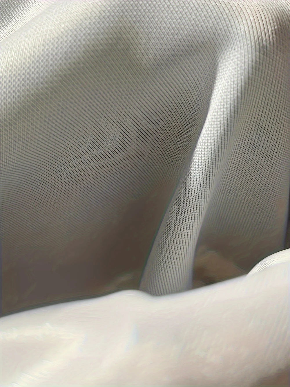 Close-up of soft fabric suitable for an Halloween pumpkin hoodie for men by EtherealBe
