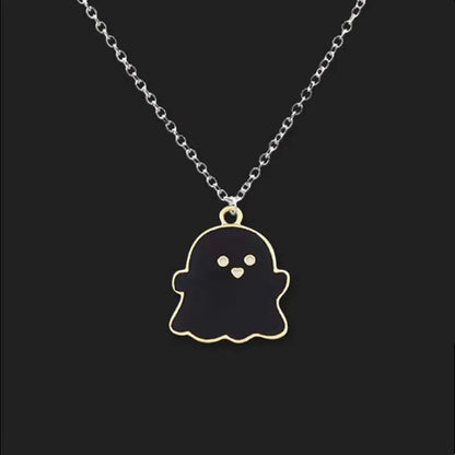 EtherealBe Halloween ghost pendant necklace in gold and black design, perfect for Halloween outfits