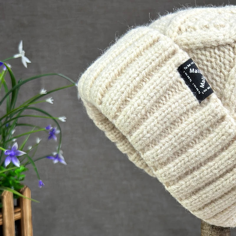 2024 New Women's hats High quality Fur pompom hat Beanies Winter Hats for women Fashion Hat bonnet Female Twist pattern caps