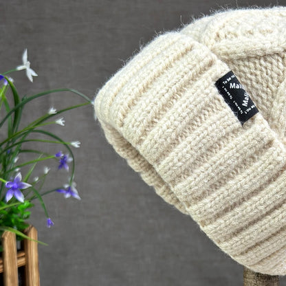 2024 New Women's hats High quality Fur pompom hat Beanies Winter Hats for women Fashion Hat bonnet Female Twist pattern caps