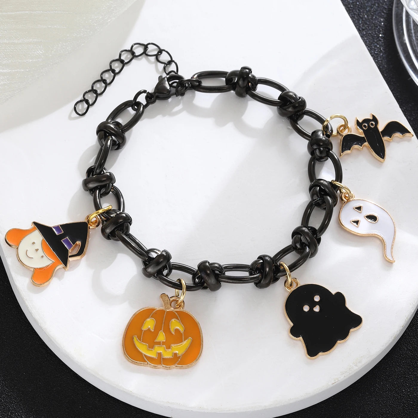 EtherealBe Halloween charm bracelet for women featuring spooky designs like a witch, ghost, bat, and pumpkin