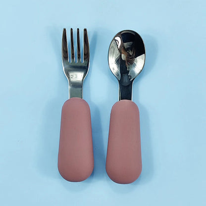 EtherealBe stainless steel baby utensils set with soft pink silicone grips for easy handling