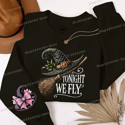 Black Halloween witch hat sweatshirt for women with a flying witch design and decorative elements