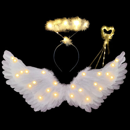 Light up angel costume for girls featuring illuminated wings, halo, and heart wand accessory