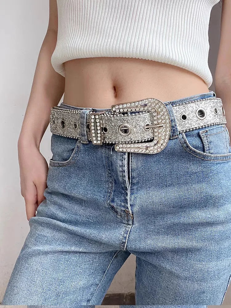 Gothic rhinestone belt for women featuring a sparkling buckle, worn with high-waisted jeans