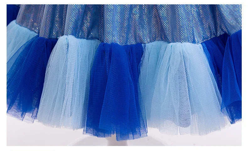 Close-up of a blue dog tutu dress for girls featuring a layered tulle skirt in varying shades of blue