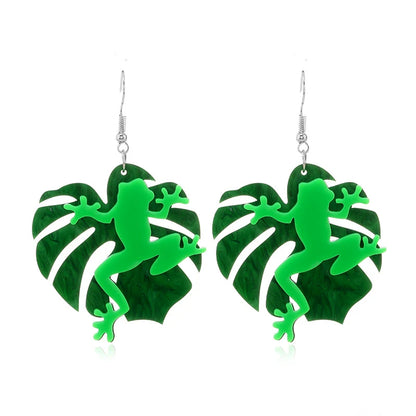 EtherealBe Halloween earrings for women featuring green frog design on leaf backdrop