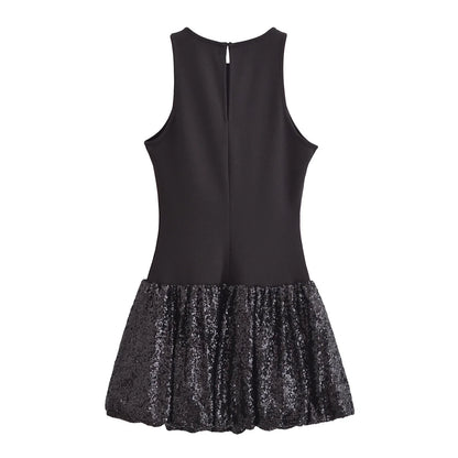 EtherealBe sleeveless chic cocktail dress with a fitted bodice and sequined flared skirt