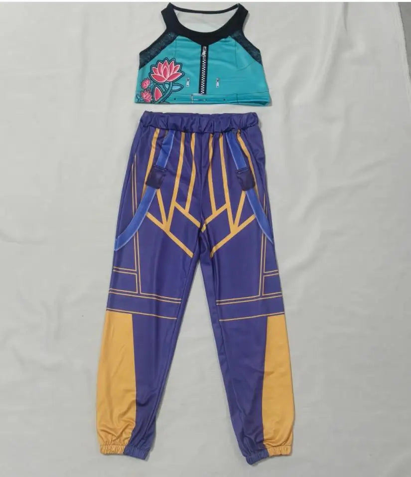 Zoey Rumi kids costume two piece teal crop top with lotus print and purple yellow geometric jogger pants