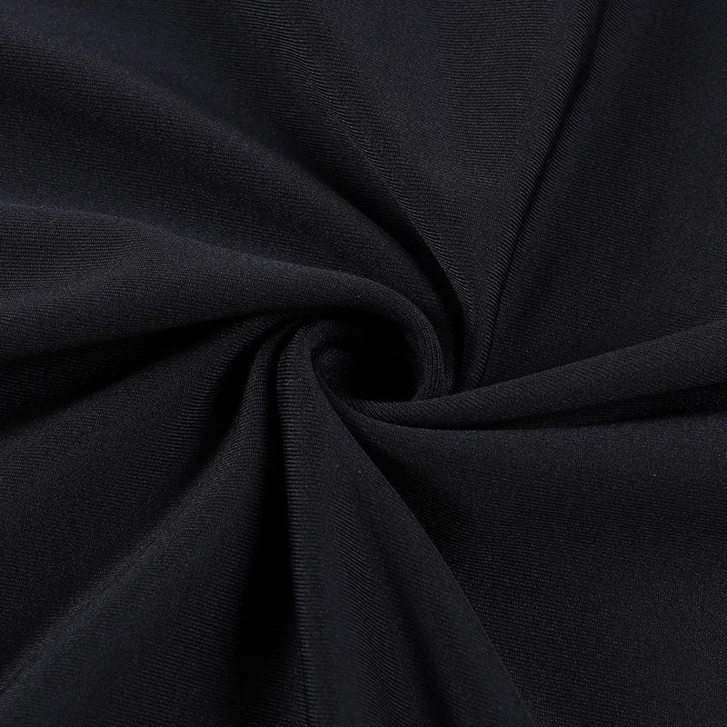 Close-up of black fabric for Adams family Morticia Halloween costume with smooth texture