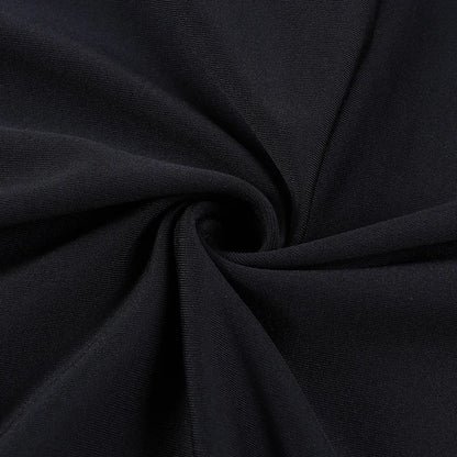 Close-up of black fabric for Adams family Morticia Halloween costume with smooth texture