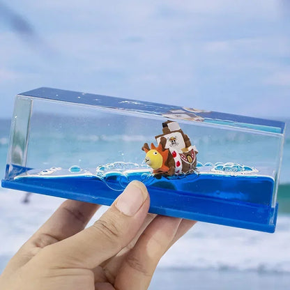Handheld One Piece Thousand Sunny drift bottle decorative toy with mini Sunny ship sailing in blue resin sea