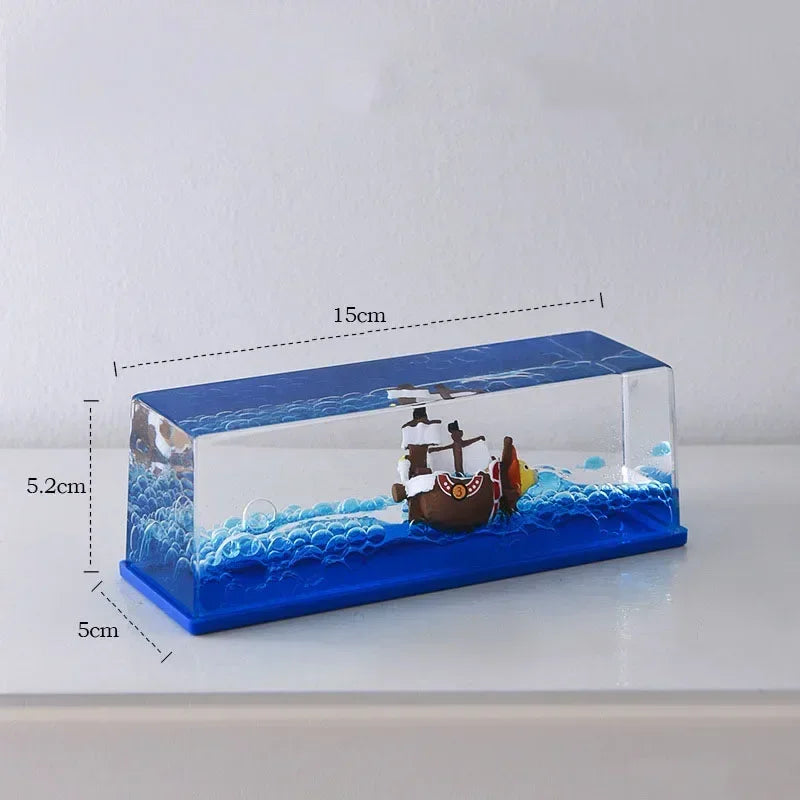 One Piece Thousand Sunny drift bottle decorative toy clear rectangular display with miniature ship and blue wave base