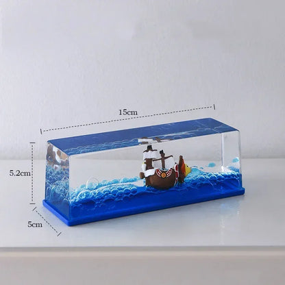 One Piece Thousand Sunny drift bottle decorative toy clear rectangular display with miniature ship and blue wave base