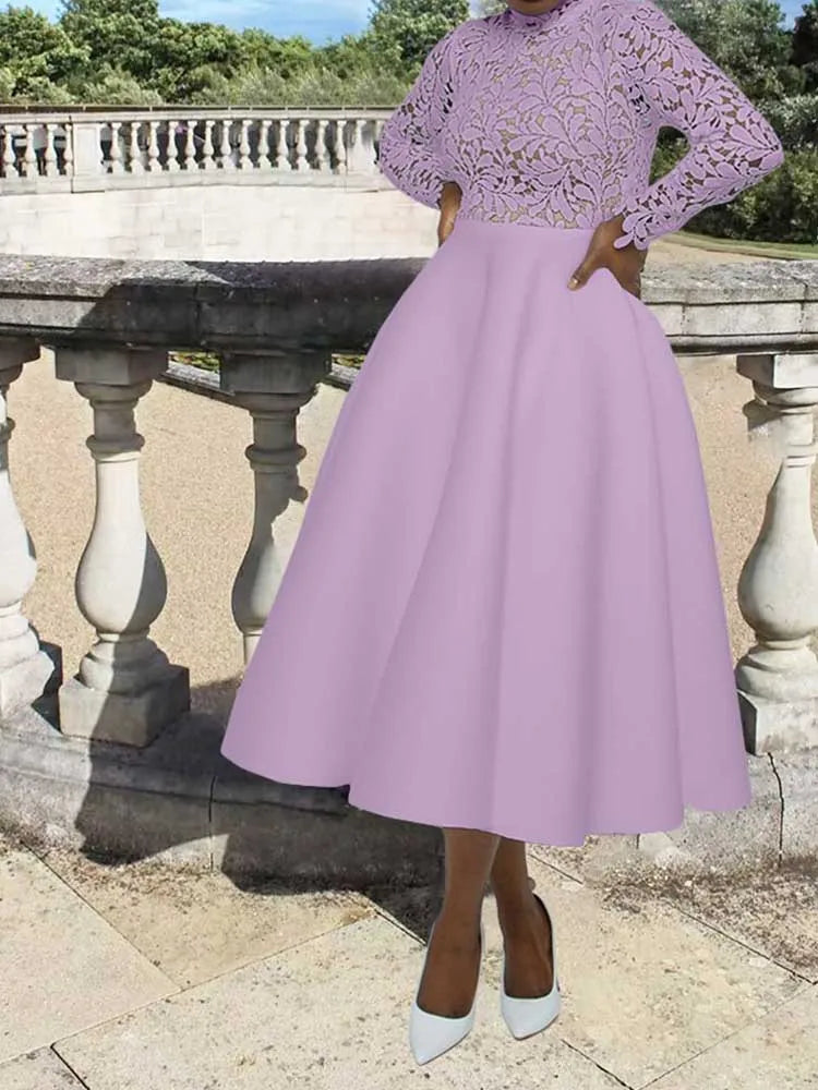 Model wearing an elegant lace party dress for women in lavender with long lace sleeves and full midi skirt