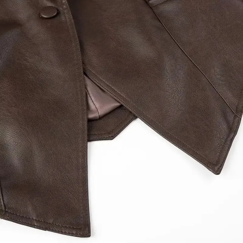 EtherealBe dark brown half collar faux leather jacket close up showing textured exterior button and soft lining hem