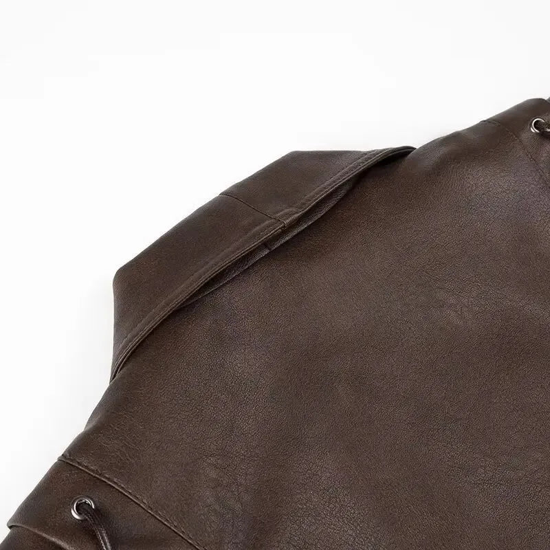 EtherealBe brown half collar faux leather jacket close up of back yoke and folded collar with metal eyelets