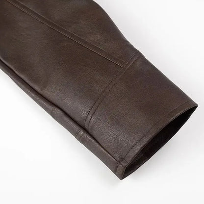 EtherealBe dark brown half collar faux leather jacket sleeve close up showing seam details