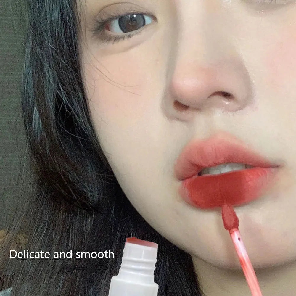 EtherealBe Hawaiian lipstick set in use, showcasing vibrant color application on smooth lips