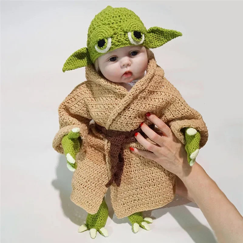Adorable baby Yoda crochet costume set with robe, hat, and gloves, perfect for little fans of Star Wars