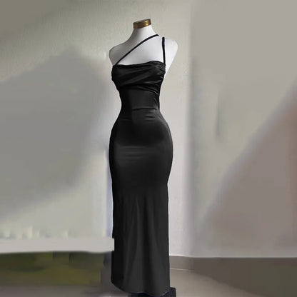 Elegant black backless evening sling dress showcasing a sleek silhouette and stylish design