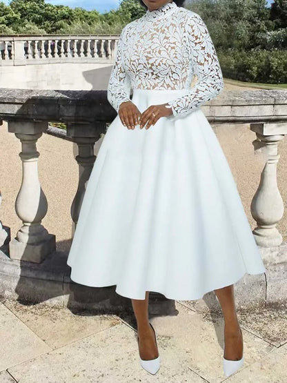 Model wearing EtherealBe elegant lace party dress for women with high neck long sleeve lace bodice and tea length skirt outdoors
