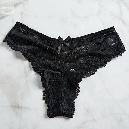 Black lace thong panty with scalloped edges on marble background part of EtherealBe lace nightgown set for women