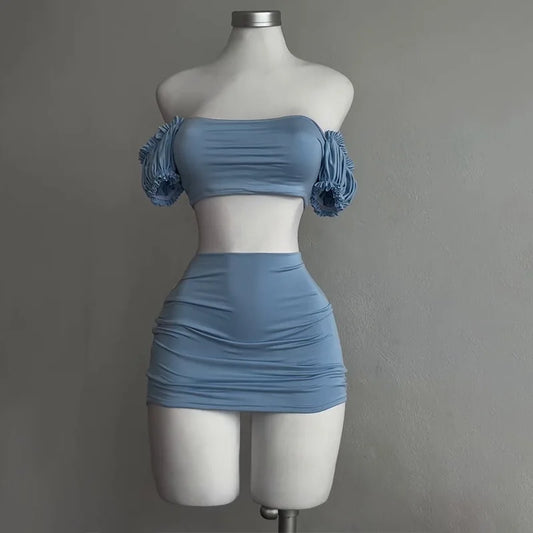 Light blue lace up tube top and skirt set on mannequin with off shoulder ruched sleeves and high waisted mini skirt