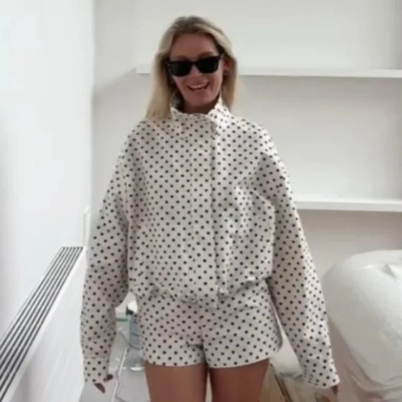 Woman wearing EtherealBe casual chic polka dot matching set oversized button jacket and shorts smiling with sunglasses indoors