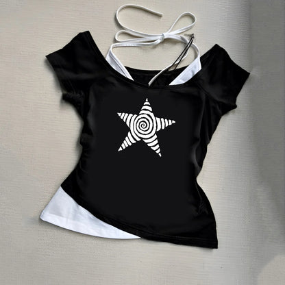 Stylish black and white star print top with unique spiral star design for a trendy look