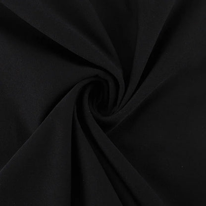 Soft fabric swirl of black high waist maxi skirt showcasing elegant drape and texture