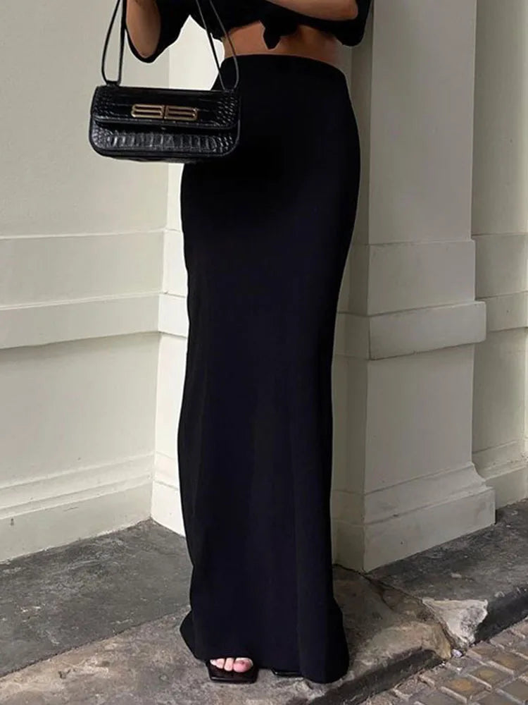 EtherealBe black high waist maxi skirt with a sleek silhouette, perfect for stylish outfits