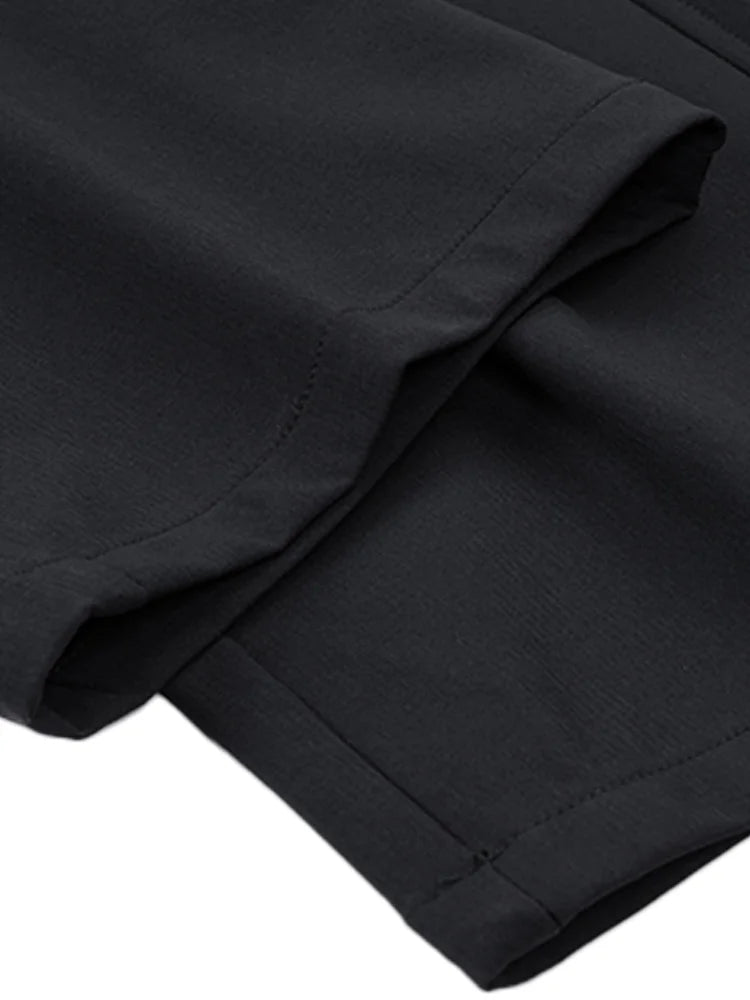 Detail view of black wide leg cargo pants women showcasing soft fabric and neat stitching