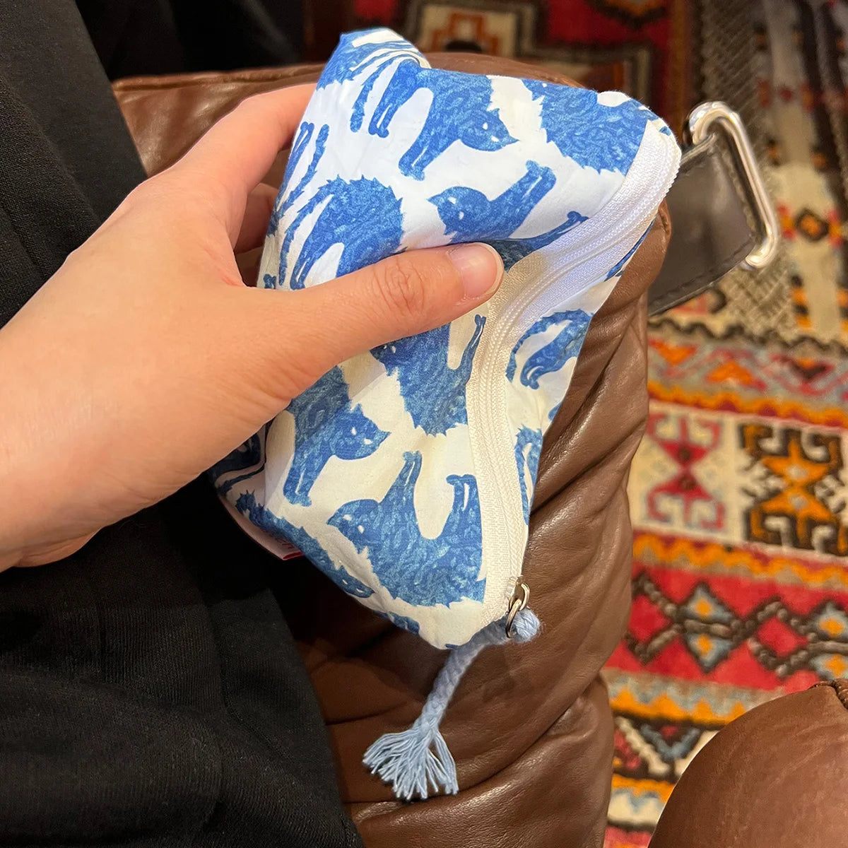 EtherealBe blue cat makeup bag with playful cat pattern, perfect for storing cosmetics