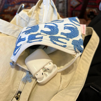 EtherealBe blue cat makeup bag featuring playful blue cat designs for stylish organization
