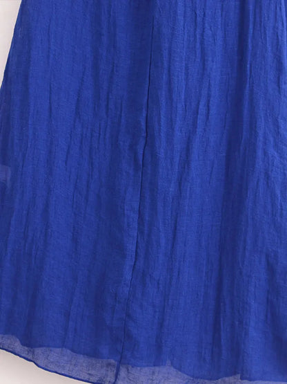 EtherealBe blue halter backless summer dress in vibrant blue fabric, perfect for warm weather