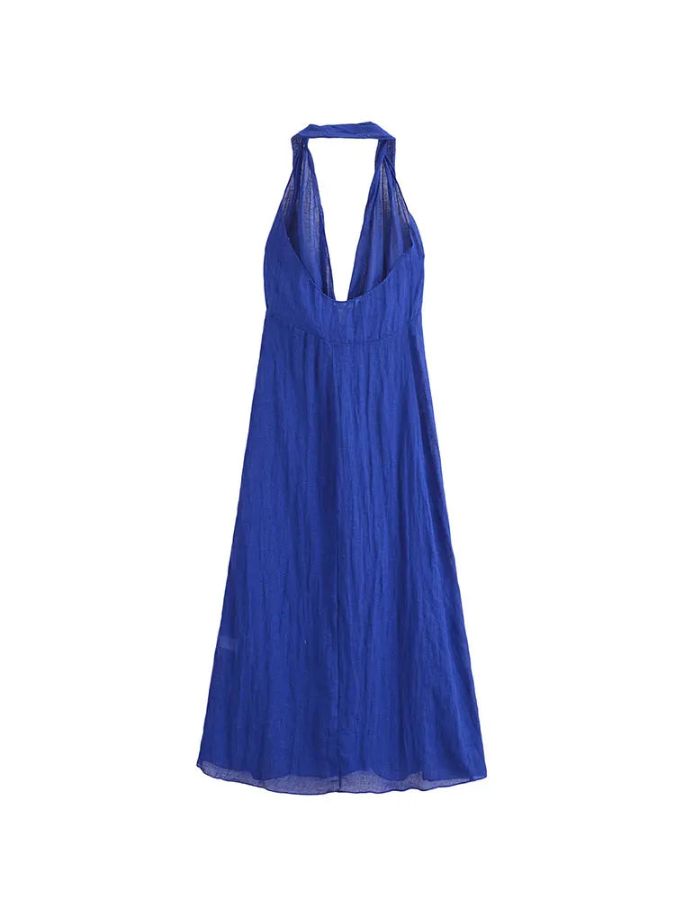 EtherealBe blue halter backless summer dress with a flowing silhouette for warm weather occasions