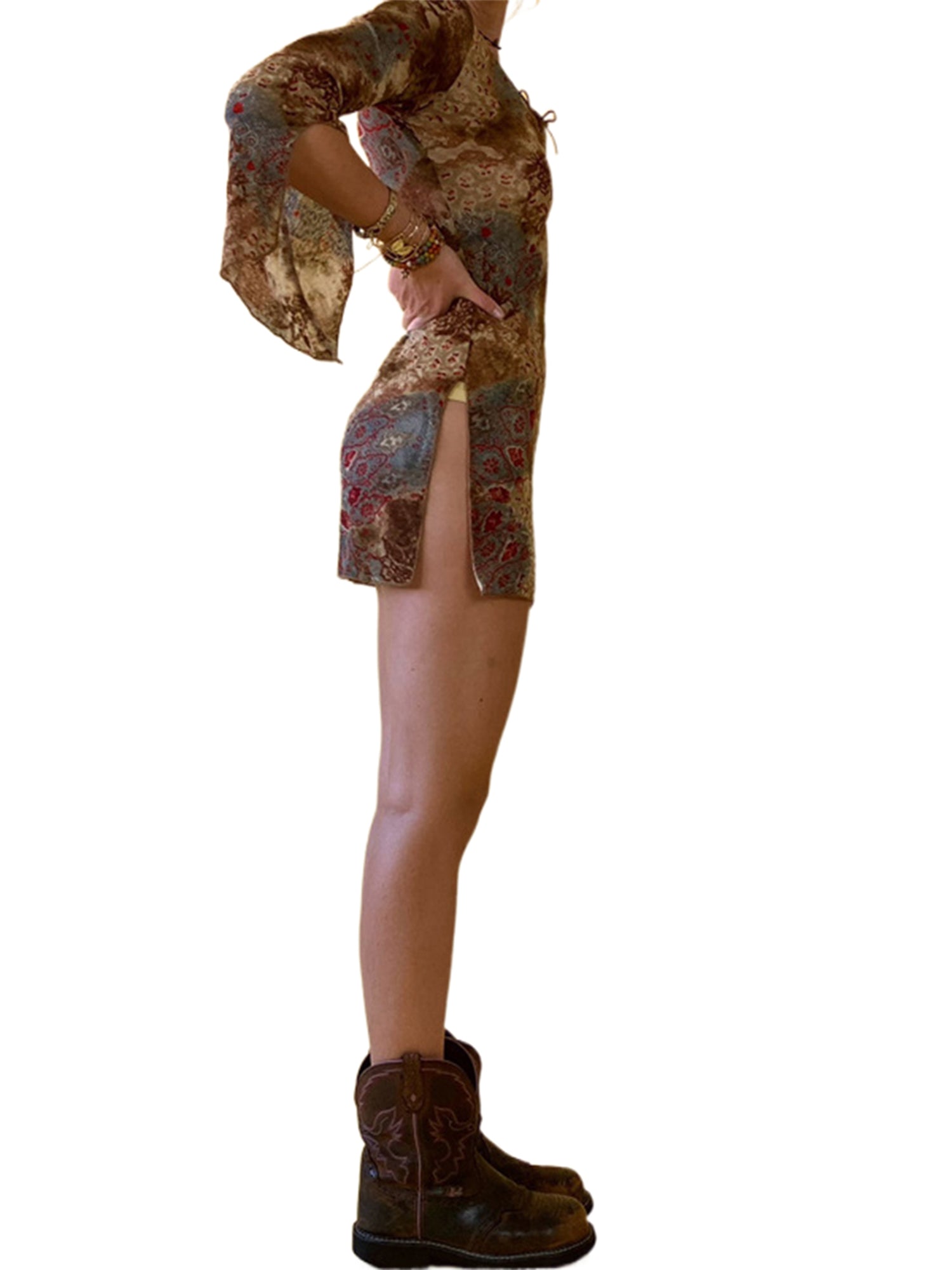 Side profile of model in EtherealBe floral mini dress with high side slit and bell sleeves wearing ankle boots flare sleeve autumn dresses women