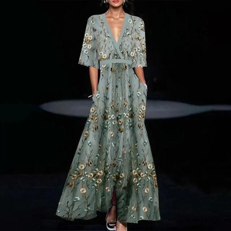 EtherealBe boho v neck maxi dress with pockets featuring floral embroidery and flowing fabric