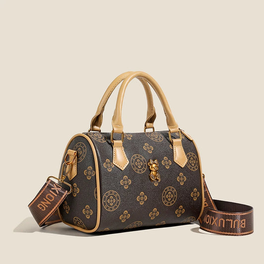 EtherealBe designer leather tote bag with stylish gold accents and a detachable shoulder strap