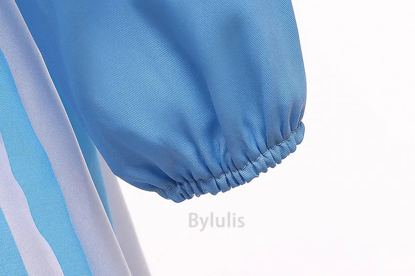 kids Alice in Wonderland costume close up of blue puffed sleeve with elastic cuff and striped skirt detail