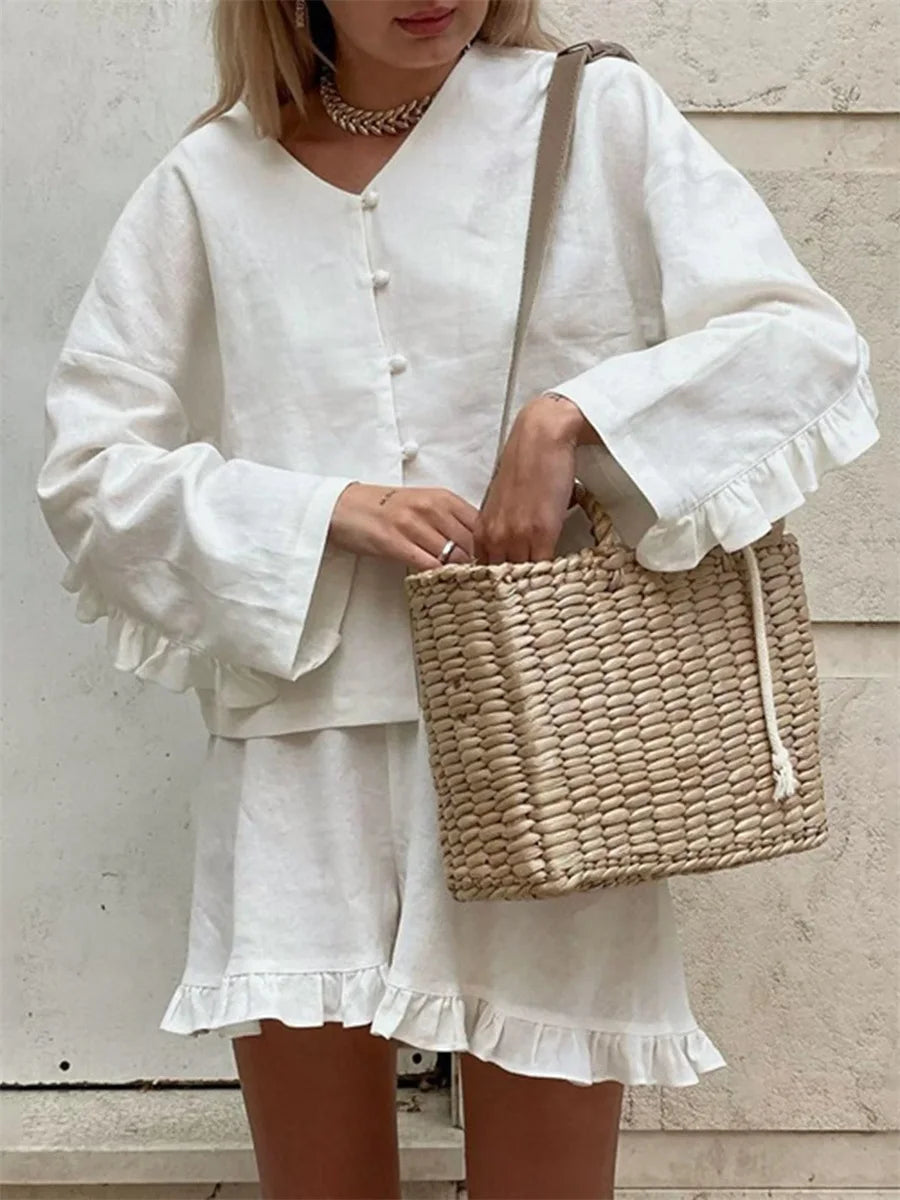 EtherealBe casual ruffle v neck outfit for women in white with a stylish straw bag