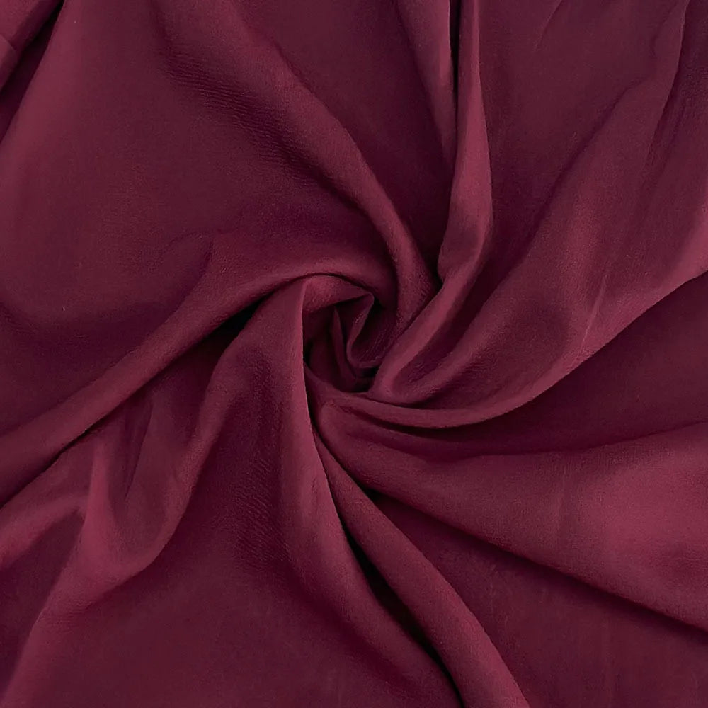 Burgundy fabric for chic long sleeve o-neck sheer top featuring a soft and flowing texture