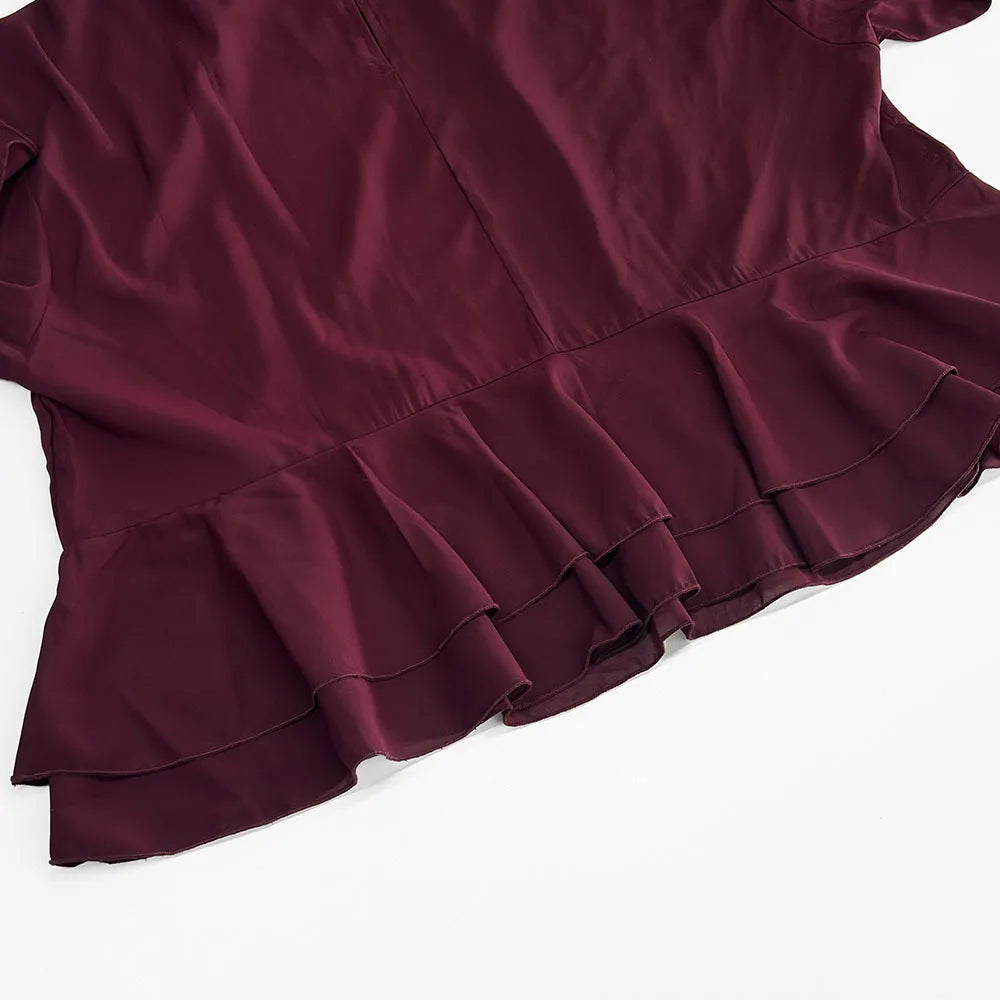 EtherealBe chic long sleeve o-neck sheer top in burgundy with a stylish peplum hem